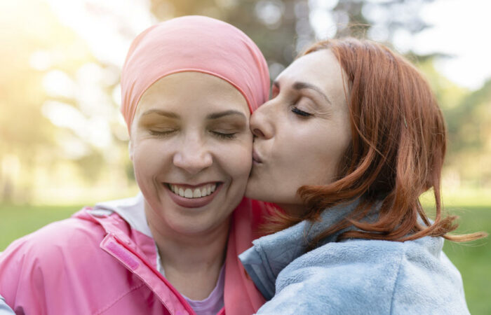 LGBTQ+ people face disparities across all aspects of cancer and cancer care. Researchers are working with LGBTQ+ communities to better understand and address these disparities. Credit: iStock